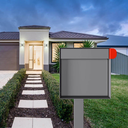 Post mount mailbox TOWN SQUARE in Gray situated in a modern curbside setting with a stylish home in the background.