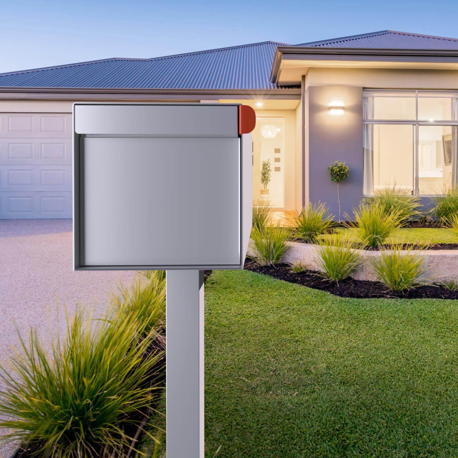Post mount mailbox TOWN SQUARE in white, stylish design in front of contemporary home, showcasing yard and driveway.