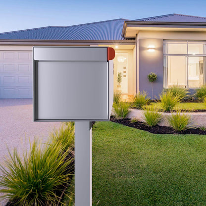 Post mount mailbox TOWN SQUARE in white, stylish design in front of contemporary home, showcasing yard and driveway.
