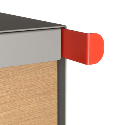 Close-up of the TOWN SQUARE residential mailbox in gray with a red wood flap.