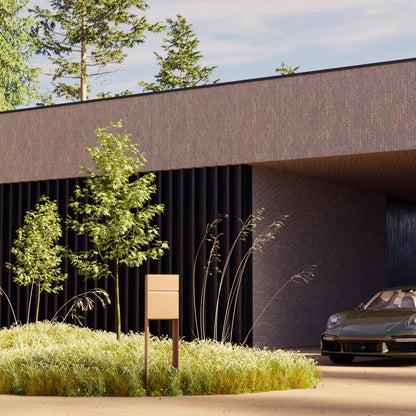 Standalone mailbox - STAND LEON by Bravios in white, set in a modern outdoor landscape with greenery and a sleek car.