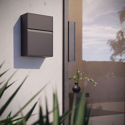 Stylish wall-mounted mailbox - LEON by Bravios in a modern outdoor setting.