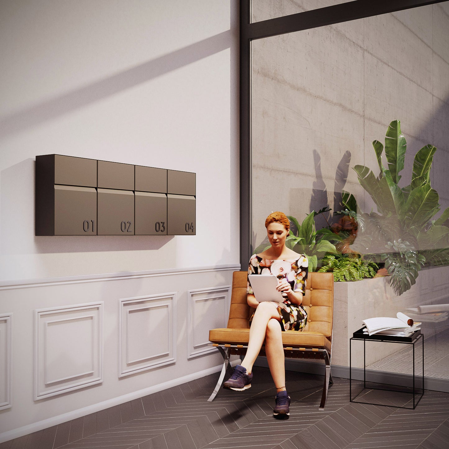 Woman sitting in stylish interior beside a wall-mounted mailbox - LEON by Bravios in Anthracite.