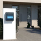 MANHATTAN by Bravios - Wall-mounted stainless steel mailbox with translucent blue front panel